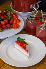 Tasty dessert strawberry cheesecake on white plate