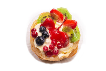 Home made cake with cream and fruits isolated.