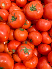 Pile of ripe red tomatoes for healthy food concept 