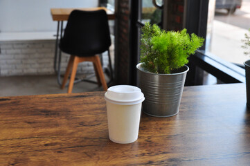 Fototapeta na wymiar paper Coffee Cup,coffee cup in coffee shop