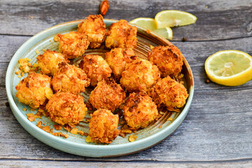  Home made Crispy Chicken   Popcorn with honey mustard sauce on wooden background