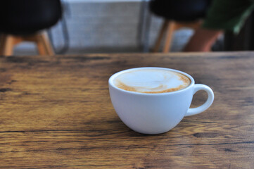cup of coffee  on wooden table