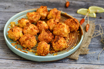  Home made Crispy Chicken   Popcorn with honey mustard sauce on wooden background