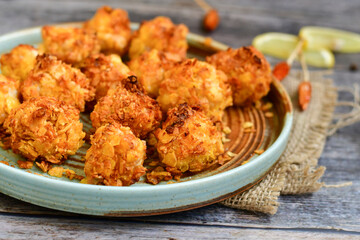 Home made Crispy Chicken   Popcorn with honey mustard sauce on wooden background