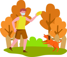 A man playing with his dog outside in autumn season while keep using medical mask