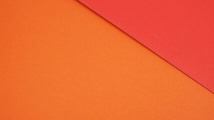 Red and orange color paper  for background.it is empty space and no people.