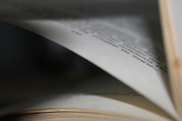 Fototapeta premium open book on black