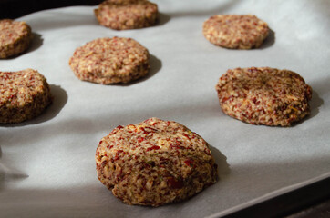 lentil burgers on baking paper close up