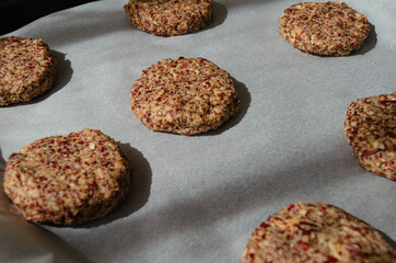 lentil burgers on baking paper close up