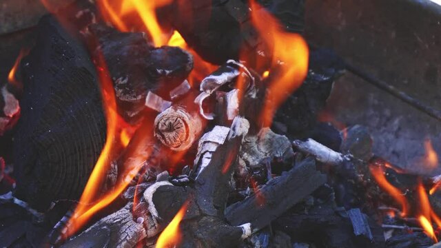 Red bonfire in the coals