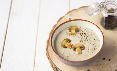 Mushroom soup, holidays, summer, autumn, vegetarian, healthy, proper nutrition, farm concept. Free space for text. smoothie soup with croutons in a tureen.