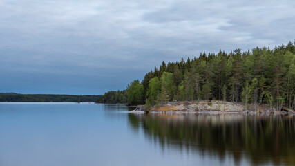 Summer twilight on island Haukkasalo on lake Päijänne in Finland