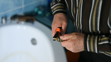 DIY faucet repair in the bathroom