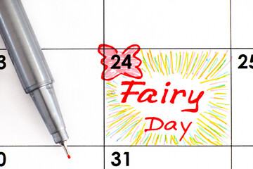 Reminder Fairy Day in calendar with pen