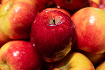 Fototapeta na wymiar Apples closeup. Fruit background. Beautiful red fruits. Healthy foods for immunity.