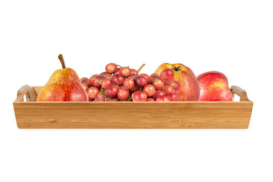wooden kitchen tray with various ripe fruits on a white background. Summer. Fresh juicy fruits