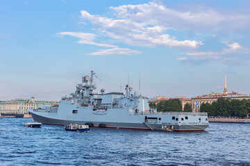 Fototapeta na wymiar St. Petersburg, Russia - July 28, 2018 - Russian warship on the Neva River in the city center