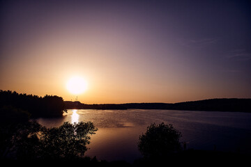 Fototapeta na wymiar sunset on the lake minsk belarus