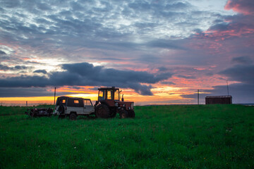 Fototapeta premium lonely old transport on sunset background