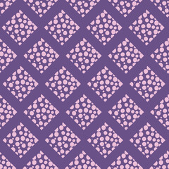 Seamless purple and pink abstract diamond with textured dots pattern with purple background.