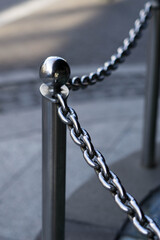 Thick metal chains by a store or a shop
