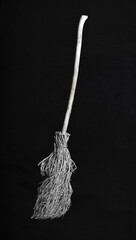witch's broom isolated on black background