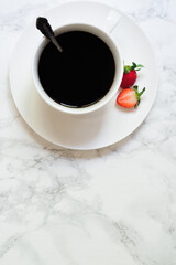 simple image of a cup of black coffee on white background 