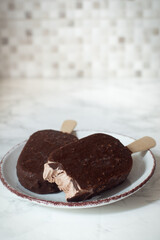 ice cream in chocolate glaze