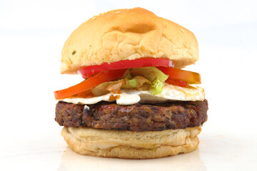 hamburger with beef and egg on a white background