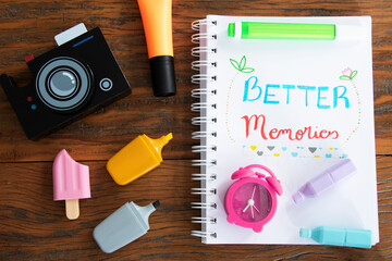 Flat lay stylish set. School stationery. Back to school concept. Top view of modern school supplies on table. Trendy back to school mock up with handmade motivational quotes over wood background.