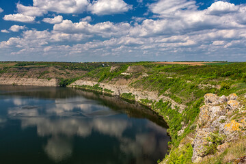 Fototapeta na wymiar Beautiful view over the river on a sunny day. Outdoor recreation. Dniester Grand Canyon.