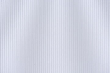 Background of corrugated colored paper. White paper texture background.