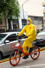 Man portrait with protection suit and mask for pandemic virus  