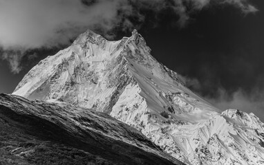 Manasalu mountain with Main Summit, 8613m & East Pinnacle, 7992m, on trail to Samagaon village from Shyala village on Manaslu Circuit trek, Mansiri Himal, Gorkha district, Nepal Himalays, Nepal.
