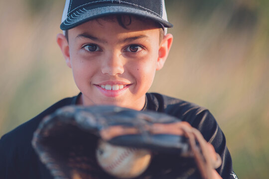 portrait of a young man with a baseball mitt stock photo royalty free stock photo royalty free 