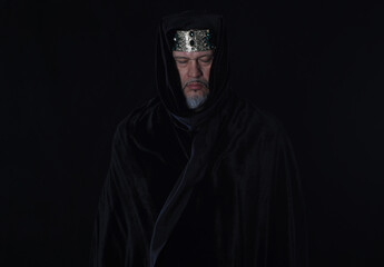 Fototapeta na wymiar portrait of a medieval king on a black background