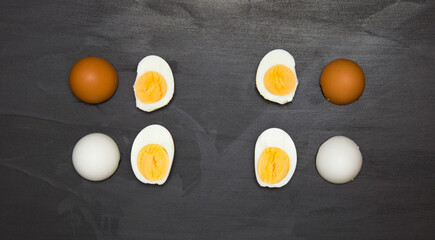 The concept of anti-racism, inside we are all the same. Support for equal rights of black people. Dark and light chicken egg and white and yolk.