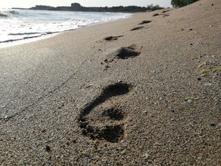 footsteps on the beach sand