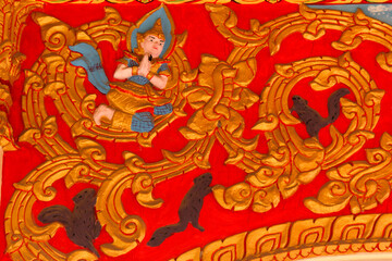 Religious scene of a wall painting and fresco in a wat in Siamese Lao PDR, Southeast Asia