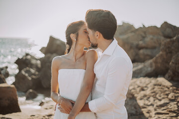 Wedding beach young couple sunset sand white happy sea waves