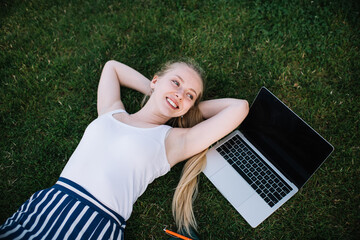 Charming Caucasian woman enjoying free day for spend on nature