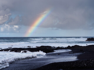 Rainbow at the coast of Tenerife island, Canary Islands, Spain