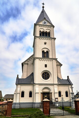 Fototapeta na wymiar A historic parochial church with a belfry Poland .