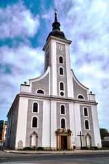 A historic church with a belfry  in the city of Javornik in the Czech Republic.