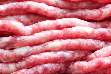 Fresh raw minced beef for cooking. Uncooked beef. Closeup minced beef.