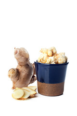 Gourmet ginger root popcorn over a white  background.