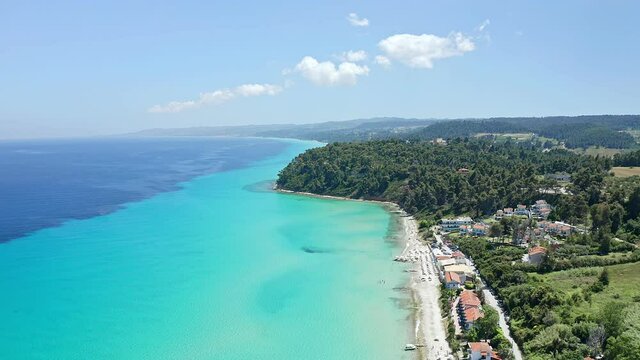 Aerial footage from waterfront to the most popular village in Halkidiki- Kallithea. It is located in the first peninsula of Halkidiki, Kassandra.