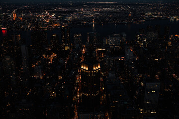 View from the Empire State Building at night in New York