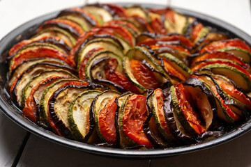 French baked ratatouille on white background