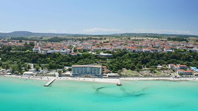 Drone shot from waterfront to the most popular village in Halkidiki- Kallithea. It is located in the first peninsula of Halkidiki, Kassandra.